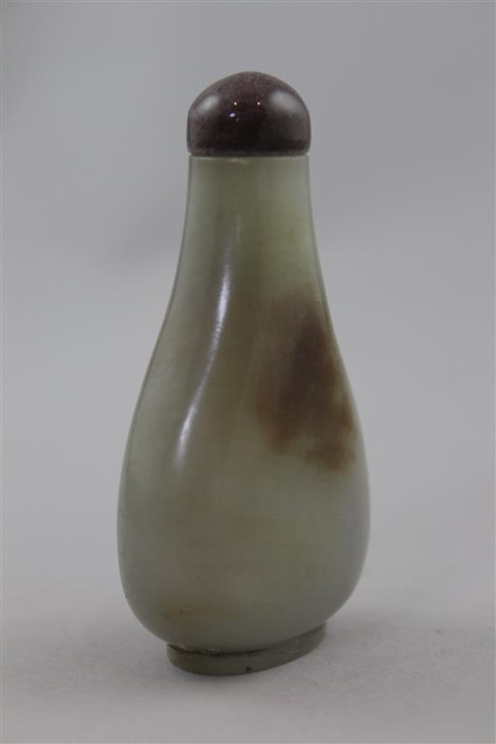 A Chinese celadon and brown jade pear shaped snuff bottle, 1750-1850, 6.1cm